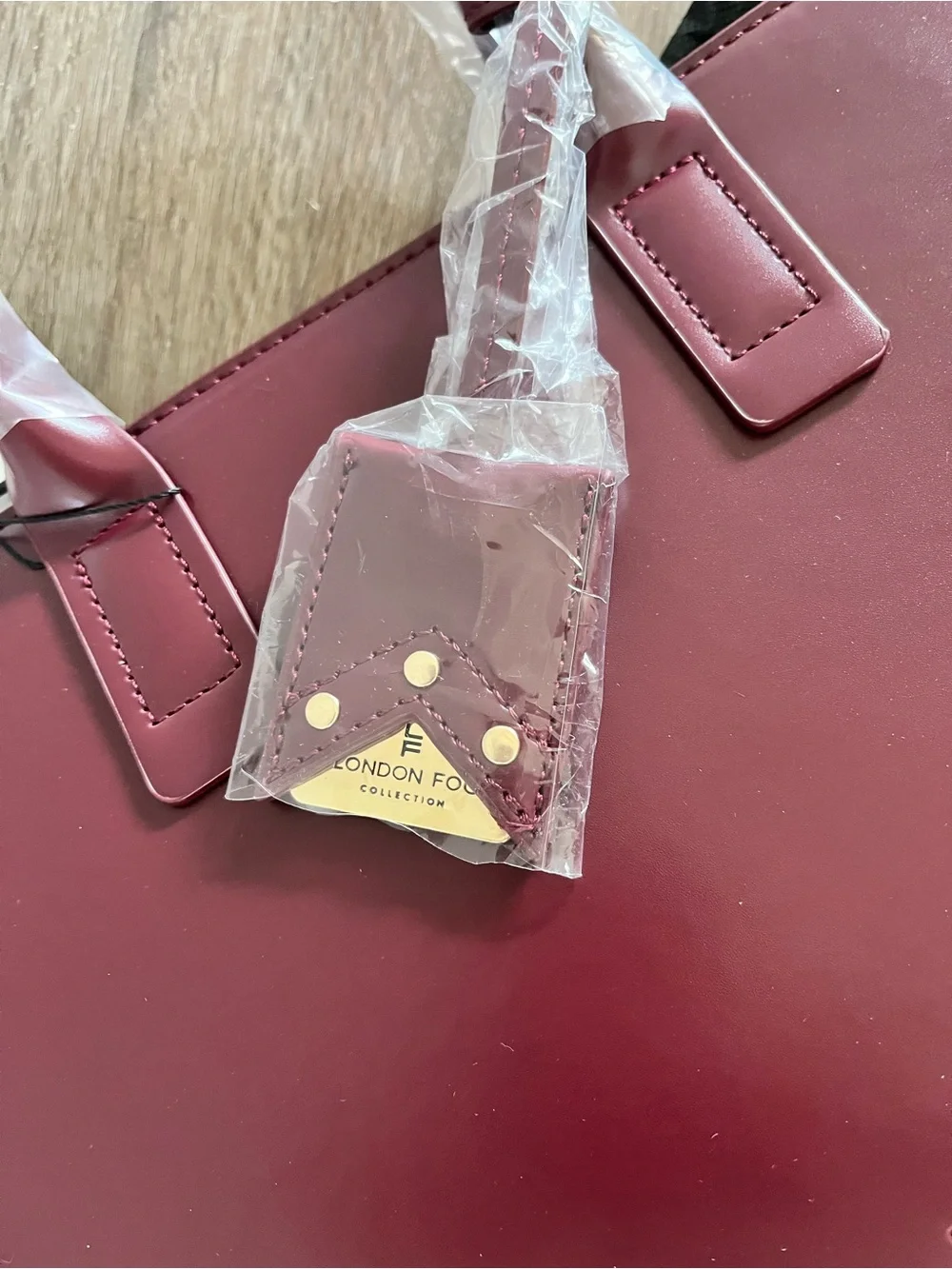 Brand New London Fog Oxblood Color Handbag/satchel style.